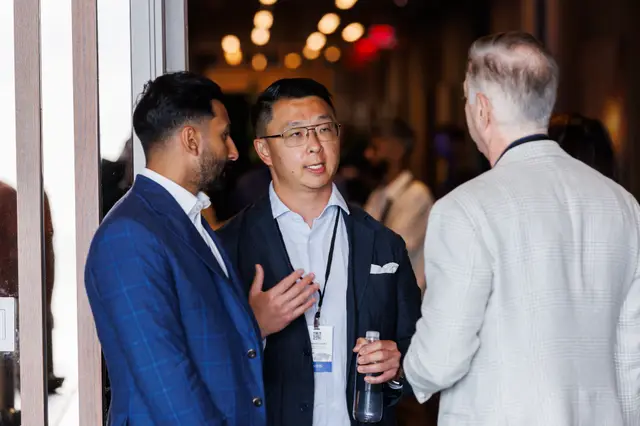 A small group talking over coffee
