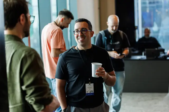 A delegate sharing a relaxed moment during a break
