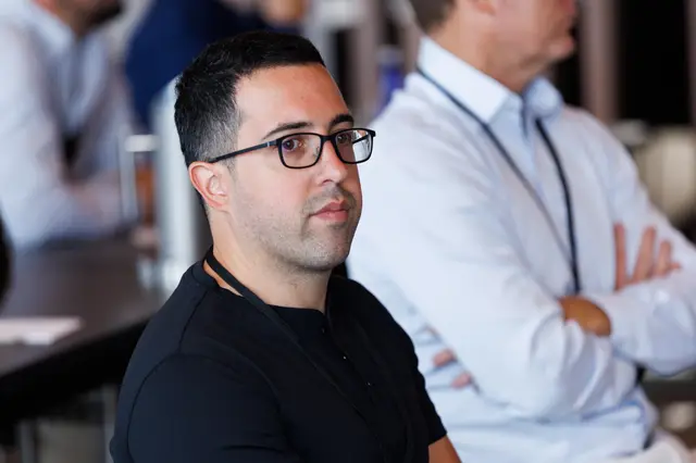A delegate taking in the session