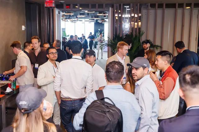 Guests mingling during the networking reception